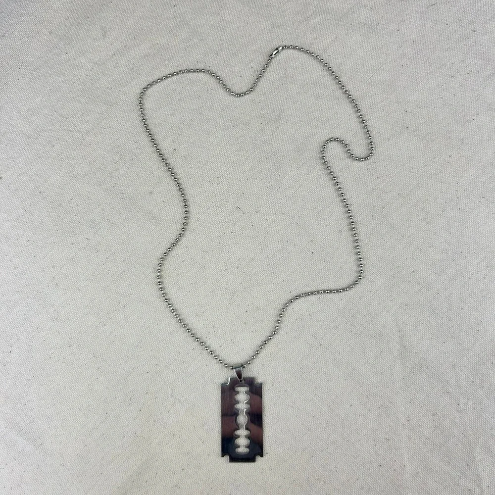 Vintage style silver razor blade pendant necklace